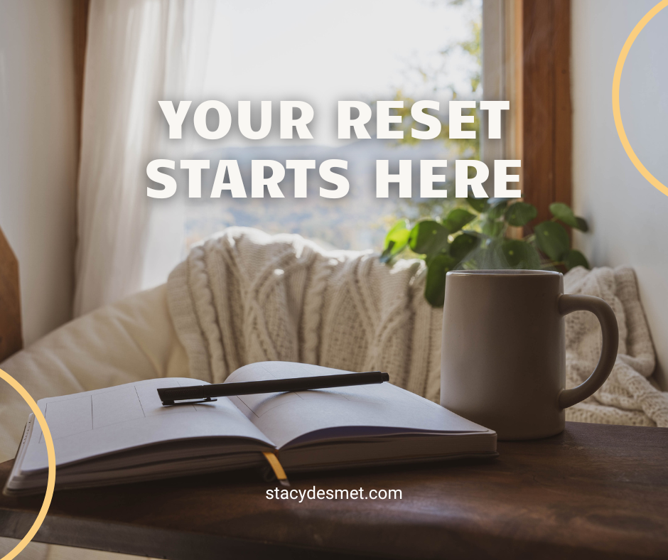 A cup of tea beside an open journal on a clean table, softly lit by natural light—symbolizing reflection, clarity, and a fresh start.